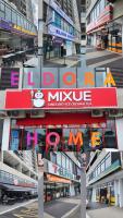 a collage of photos of a building with different signs at Rumah No 3 Youth City Residence Nilai in Nilai