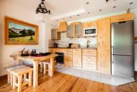 Kuchyňa alebo kuchynka v ubytovaní Apartamenty Kiry Zakopane
