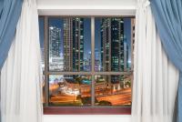 Nespecifikovaný výhled na destinaci Dubaj nebo výhled na město při pohledu z apartmánu