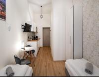 Posteľ alebo postele v izbe v ubytovaní Apartamenty Mikubo Wrocław