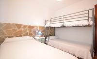 Postel nebo postele na pokoji v ubytování Casas Paqui y Pablo con piscina compartida en Conil