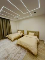 Postel nebo postele na pokoji v ubytování Lux private home Sheikh zayed