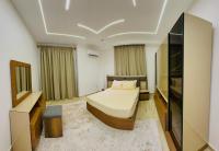 Postel nebo postele na pokoji v ubytování Lux private home Sheikh zayed
