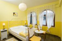 Posteľ alebo postele v izbe v ubytovaní Guest House Rajic