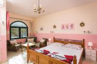 Posteľ alebo postele v izbe v ubytovaní Guest House Rajic