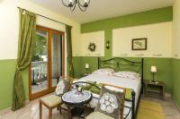 Posteľ alebo postele v izbe v ubytovaní Guest House Rajic