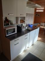 Kuchyň nebo kuchyňský kout v ubytování Chalet Diana Lakefront