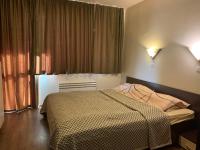 Postel nebo postele na pokoji v ubytování Sunrise Apartment Pamporovo