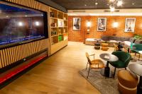 Campanile Prime Paris 19 - La Villetteにあるテレビまたはエンターテインメントセンター