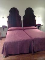 Postel nebo postele na pokoji v ubytování Hotel Iberia Plaza Mayor