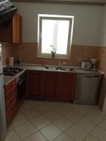 Kuchnia lub aneks kuchenny w obiekcie Apartman Carpe Diem