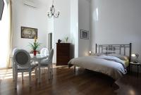 A bed or beds in a room at Napoli Pietrasanta LT