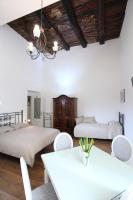 A bed or beds in a room at Napoli Pietrasanta LT
