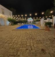 The swimming pool at or close to MASSERIA INCANTAMENTO Suite Bouganville
