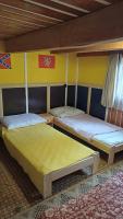Postel nebo postele na pokoji v ubytování Trempská Chalupa Aronie