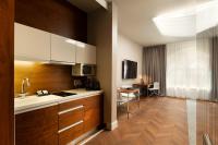 Kuchyňa alebo kuchynka v ubytovaní City Park Hotel & Residence