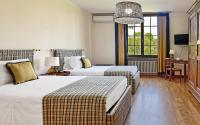 A bed or beds in a room at Golf Club Margara