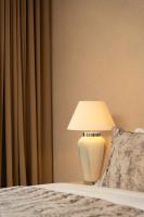 Posteľ alebo postele v izbe v ubytovaní City Park Hotel & Residence