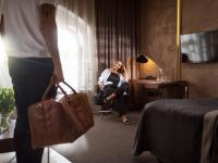 Televízia a/alebo spoločenská miestnosť v ubytovaní City Park Hotel & Residence