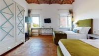 A bed or beds in a room at Golf Club Margara