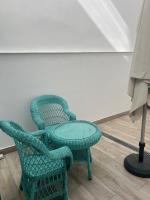 A seating area at La Posada del Teatro H Boutique Parking Gratis
