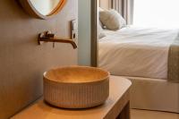 Łóżko lub łóżka w pokoju w obiekcie Iberostar Selection Es Trenc -New Opening-