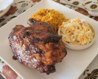 a plate of food with meat and a side of rice at Matopo Ingwe Lodge in Matopos