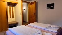 Łóżko lub łóżka w pokoju w obiekcie Ferienwohnung Vesna & Alex