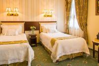 Posteľ alebo postele v izbe v ubytovaní Palace Hotel Polom
