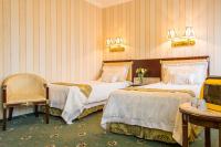 Posteľ alebo postele v izbe v ubytovaní Palace Hotel Polom