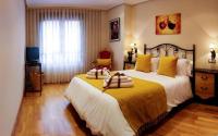 Postel nebo postele na pokoji v ubytování Clarens Guesthouse