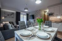 Kuchyňa alebo kuchynka v ubytovaní Trevilles Apartamenty - Green Hills