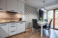Kuchyňa alebo kuchynka v ubytovaní Trevilles Apartamenty - Green Hills