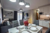 Kuchyňa alebo kuchynka v ubytovaní Trevilles Apartamenty - Green Hills