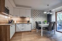 Kuchyňa alebo kuchynka v ubytovaní Trevilles Apartamenty - Green Hills