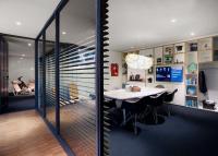 a dining room with a table and some chairs at citizenM Southwark Bankside in London