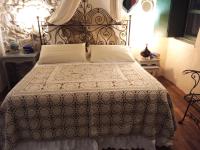 A bed or beds in a room at Villa in Campagna con Piscina Privata