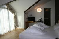 Posteľ alebo postele v izbe v ubytovaní Hotel Orso Grigio