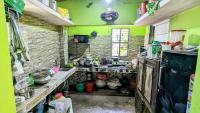 Una cocina o cocineta en Sundarban Tulip Homestay, Pakhiralay, WB