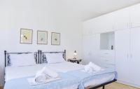 Posteľ alebo postele v izbe v ubytovaní Stunning Home In Ampela, Syros