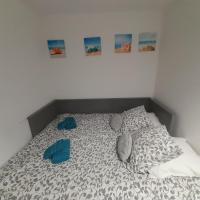Łóżko lub łóżka w pokoju w obiekcie Petit paradis classé 3 étoiles à 200m de la plage! Terrasse-Wifi-Parking-clim