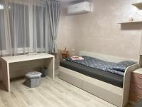 Postel nebo postele na pokoji v ubytování В къщи