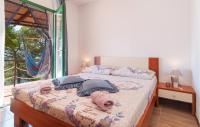 Posteľ alebo postele v izbe v ubytovaní Holiday Home Gdinj With Sea View I