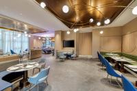 TV a/nebo společenská místnost v ubytování Echarm Plus Hotel - Xi'an Daminggong West Subway Station