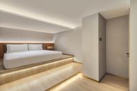 Echarm Plus Hotel - Xi'an Daminggong West Subway Stationにあるベッド