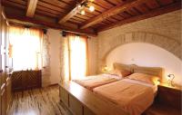 Posteľ alebo postele v izbe v ubytovaní Holiday Home Banki V