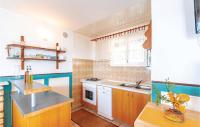 Kuchyň nebo kuchyňský kout v ubytování Holiday Home Stratincica Ii