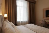 CALVARY Hotel & Restaurant Vilniusにあるベッド