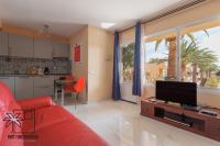 TV a/nebo společenská místnost v ubytování Sabrihome Pool and Terrace iRent Fuerteventura