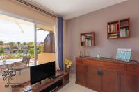TV a/nebo společenská místnost v ubytování Sabrihome Pool and Terrace iRent Fuerteventura